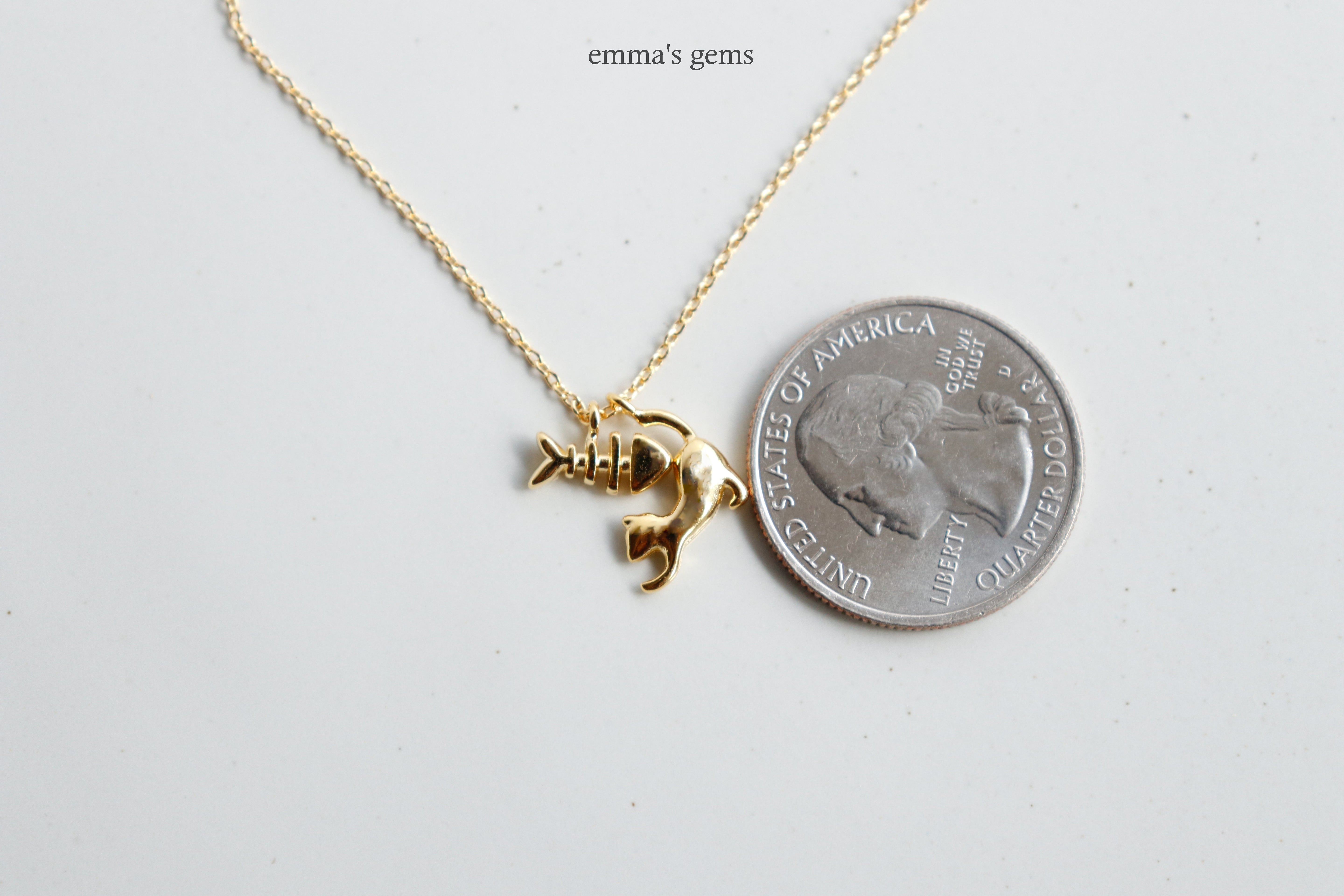 Dainty Cat and Fishbone Charm Necklace with a quarter for size scale, Fish Kitty, Gold Dipped, Unique Animal Jewelry, Women's Pendant for Birthdays, Gifts