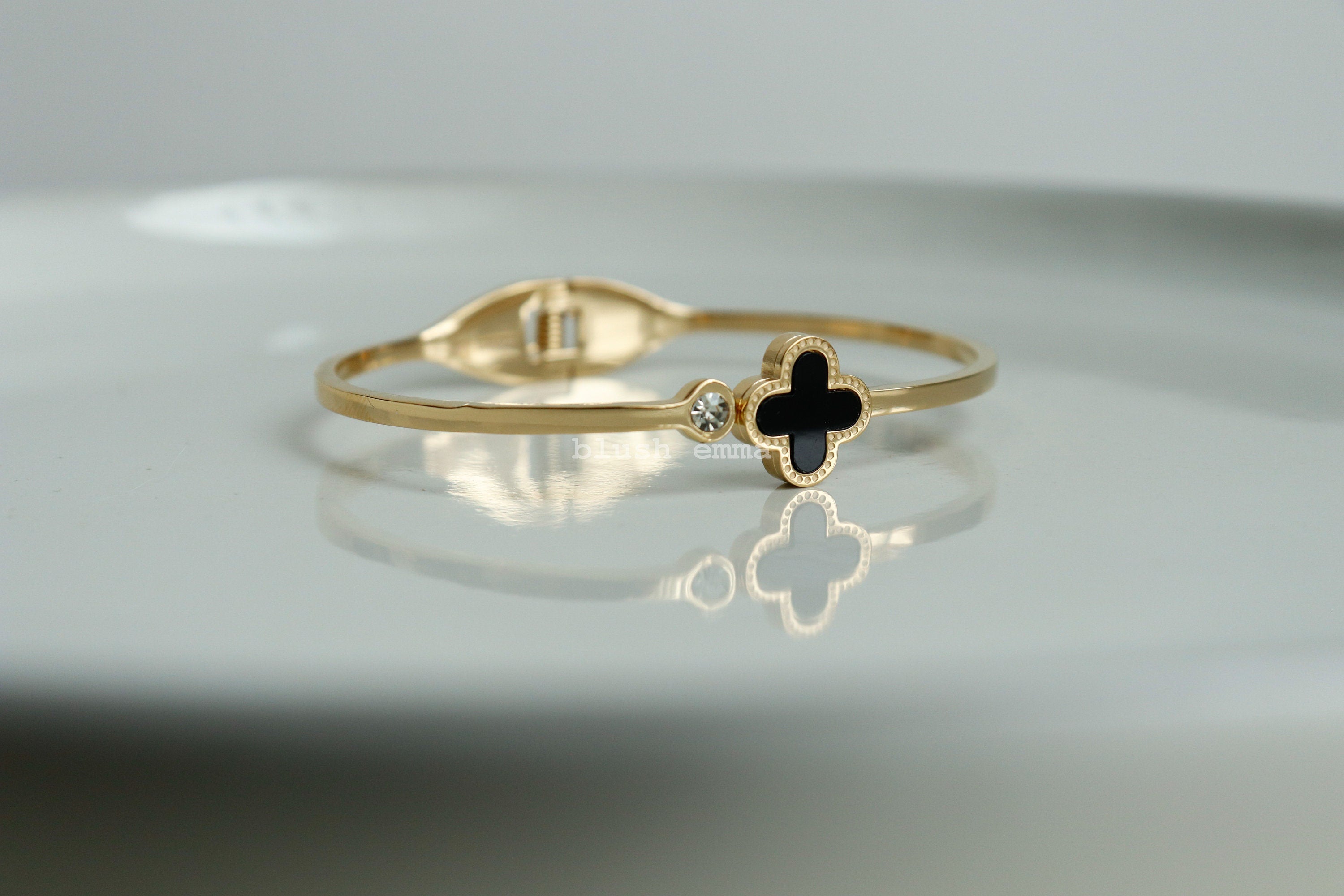 Black Clover with Accent Cubic Spring Bangle Bracelet